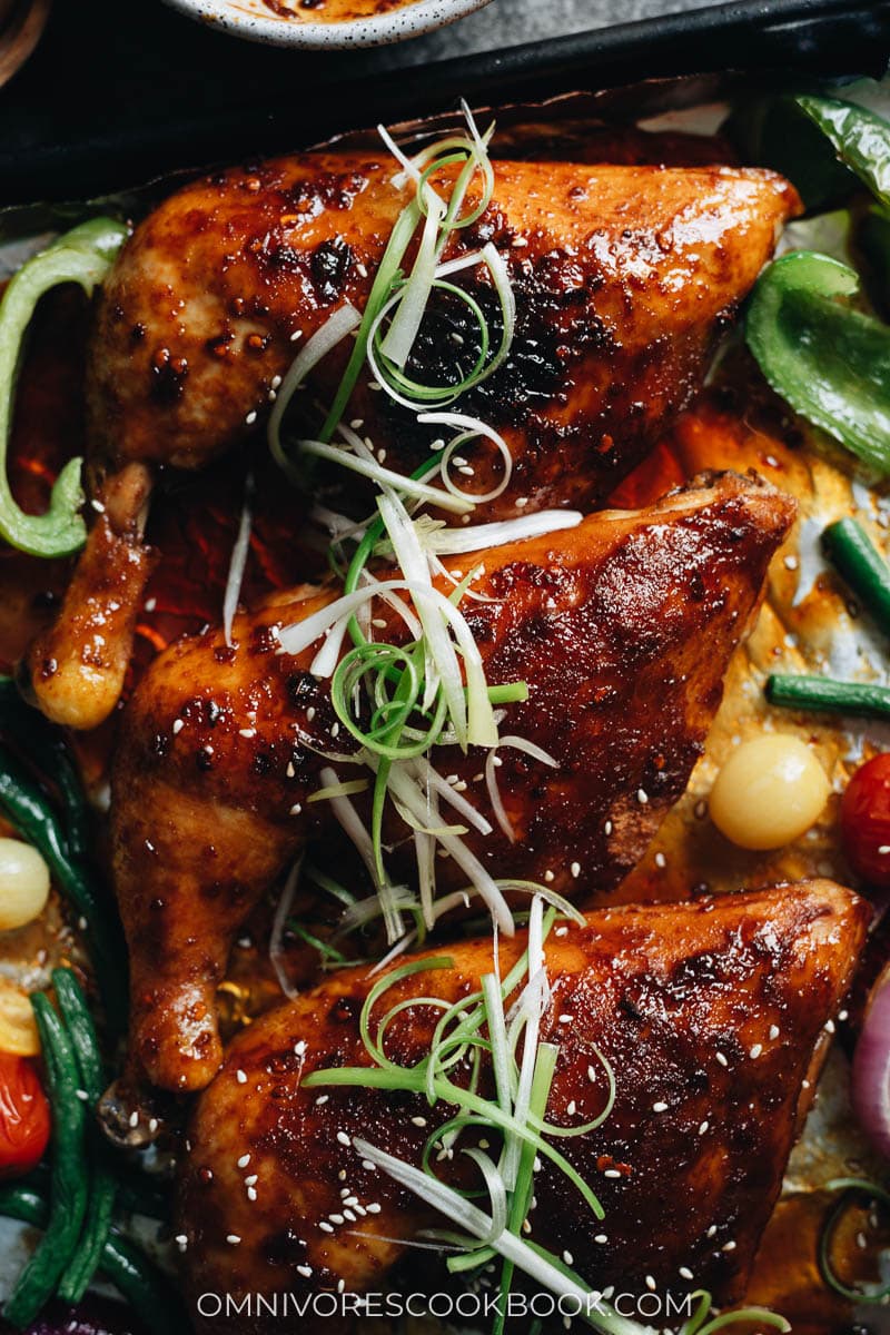Asian style roast chicken legs and thighs with green onion
