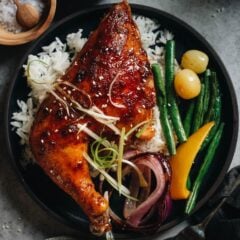 Honey-Soy Glazed Chicken is roasted until super juicy and tender in foil and then broiled with a glaze to give you a beautifully caramelized sweet-savory chicken dinner. And you can broil some veggies along with the chicken to create a colorful and balanced meal!