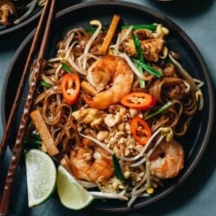 Make this fresh and rich shrimp pad thai in your own kitchen using this super fast and easy recipe that highlights the vibrant flavor of the ingredients. These chewy rice noodles are cooked in a tangy sauce that’s slightly sweet, and loaded with goodies that add fun texture. {Gluten-Free}