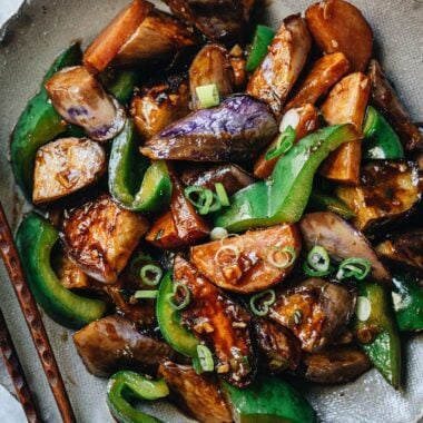 Stir fried eggplant, potato and pepper close up