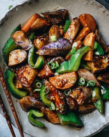Stir fried eggplant, potato and pepper close up