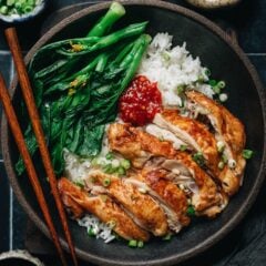 Learn this super easy recipe to create extra juicy and tender roast chicken chicken with a crispy skin that is very fragrant. It’s a modernized version of the salt baked chicken and uses the oven to largely simplify the process and create a great result. It’s so easy to prepare and fast to cook, that you can make it for a weeknight dinner. But the result is so amazing that I would definitely serve it for occasions such as Chinese New Year. {Gluten-Free adaptable}