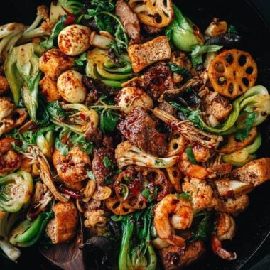 Spicy numbing stir fry pot with vegetables, beef and shrimp