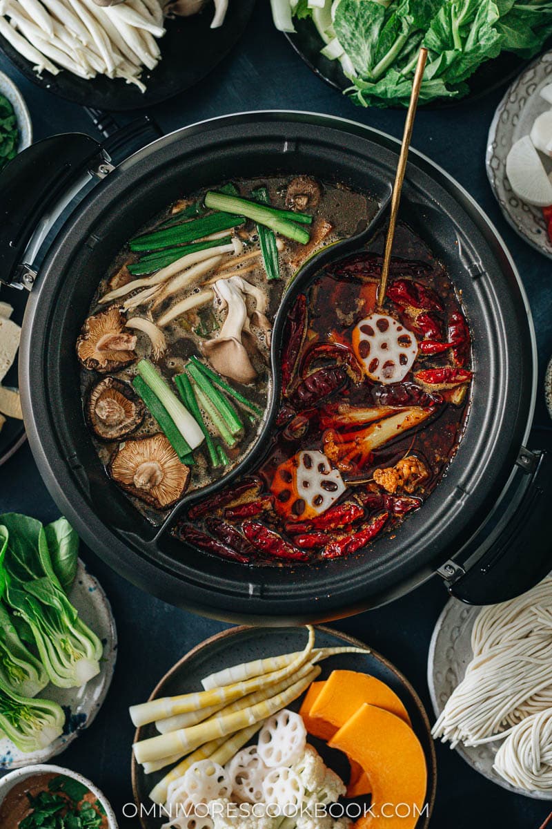 Hot pot with a divider serving spicy and non-spicy broth