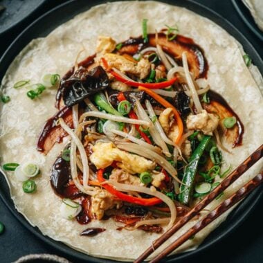 Vegetarian moo shu on a moo shu wrapper