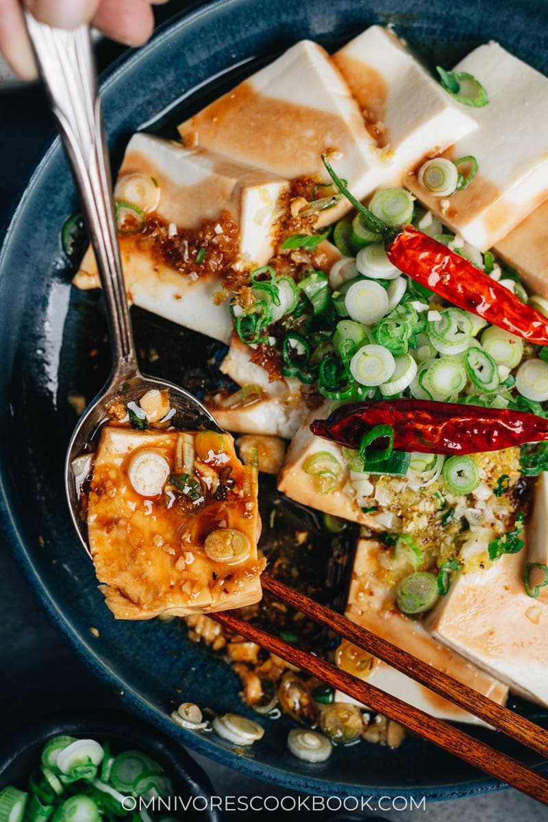 Steamed tofu with sauce close up