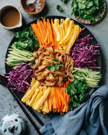 Northern Chinese potato noodles in sesame sauce with vegetables and eggs