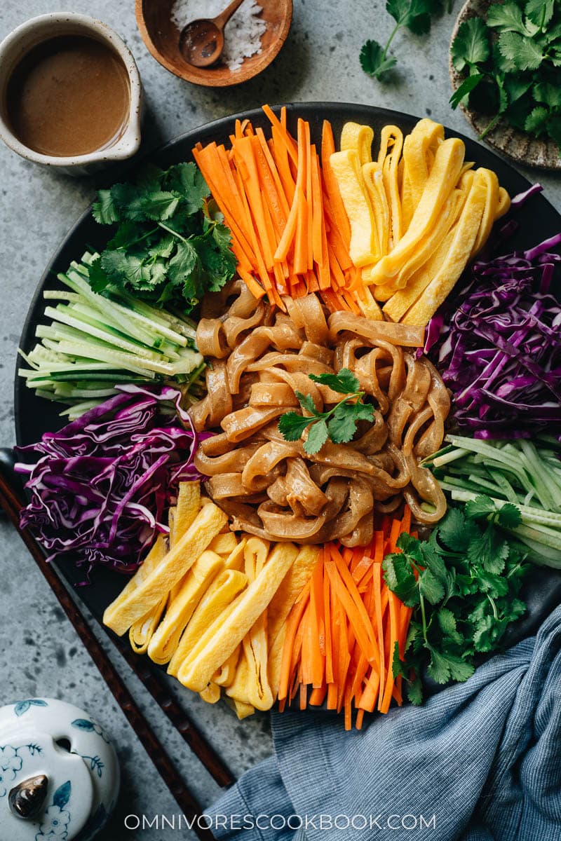 Da La Pi with cucumber, carrot, eggs, and purple cabbage