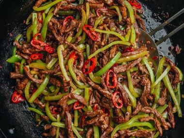 Chinese shredded beef and pepper stir fry in a pan