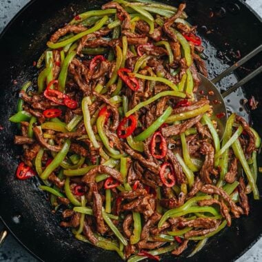 Chinese shredded beef and pepper stir fry in a pan