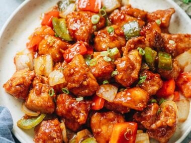 Sweet and sour chicken with pepper and onion
