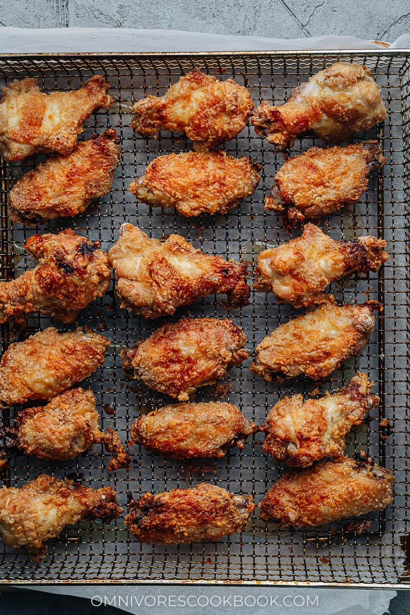 Fried wings on an air fryer basket