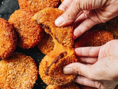 Breaking apart a Chinese pumpkin cake