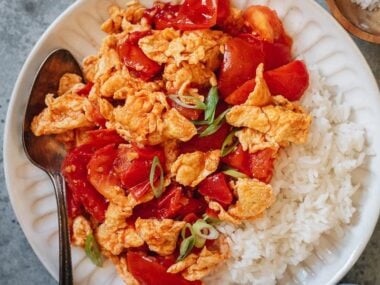 Tomato and egg stir fry served with steamed rice