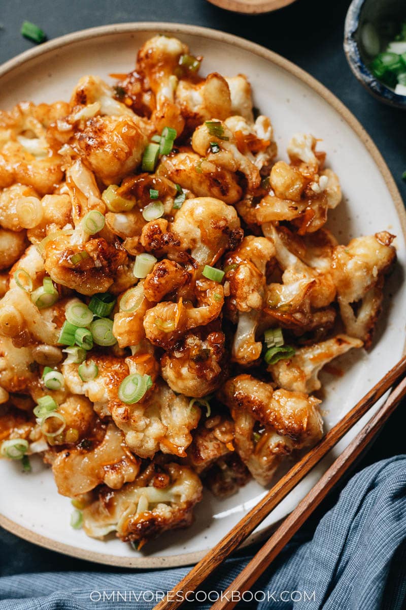 Homemade orange cauliflower in a plate close up