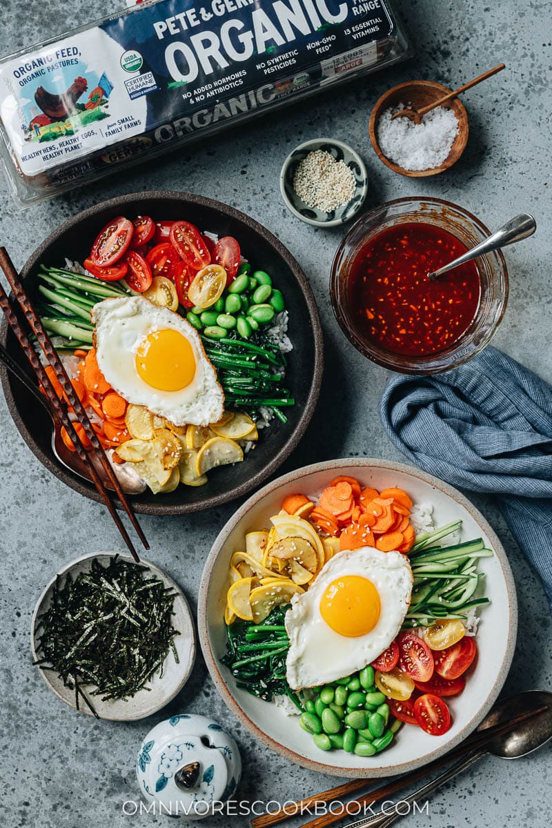 Vegetable bibimbap served with chili sauce and seaweed