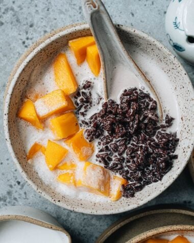 Black rice pudding with coconut milk close up