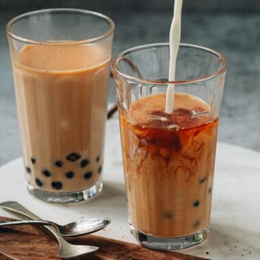 Pouring milk into bubble tea
