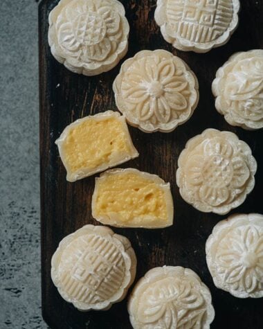 Snow skin mooncake with custard sliced open close up