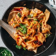 An authentic spicy wonton in chili oil recipe that yields tender wontons smothered in the most scrumptious sauce that is spicy, savory and sweet, just like the street food you&rsquo;d get in Sichuan
