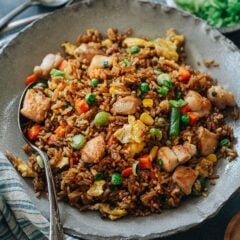 For a super fast and delicious dinner, my chicken fried rice is here for you, full-flavored and quicker than any delivery! The crispy rice is mixed with tender juicy chicken, crunchy veggies, and a savory sauce that tastes even better than the Chinese restaurant version.