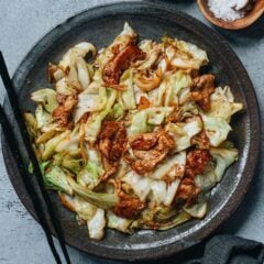 This pork and cabbage stir fry is an irresistible homestyle dish that is easy to make and very comforting. It combines tender slices of marinated pork with sweet, buttery Taiwanese flat cabbage. Try it and you&rsquo;ll be surprised how something so simple can be so satisfying!