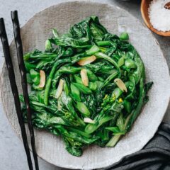 This simple yu choy stir fry requires only 4 ingredients and 10 minutes to put together. It&rsquo;s a quick side dish you can throw together in a rush to add nutrition to your dinner. {Gluten-Free, Vegan}