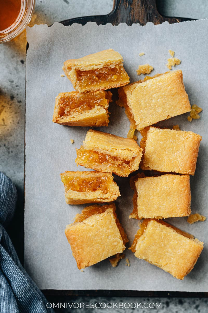 Simplified large pineapple cake, sliced into pieces