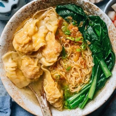 An authentic tasting Cantonese wonton noodle soup with juicy pork and shrimp wontons, thin chewy Hong Kong noodles, and fragrant homemade chicken stock. Follow this recipe and you&rsquo;ll create a dish that tastes even better than the restaurant version.