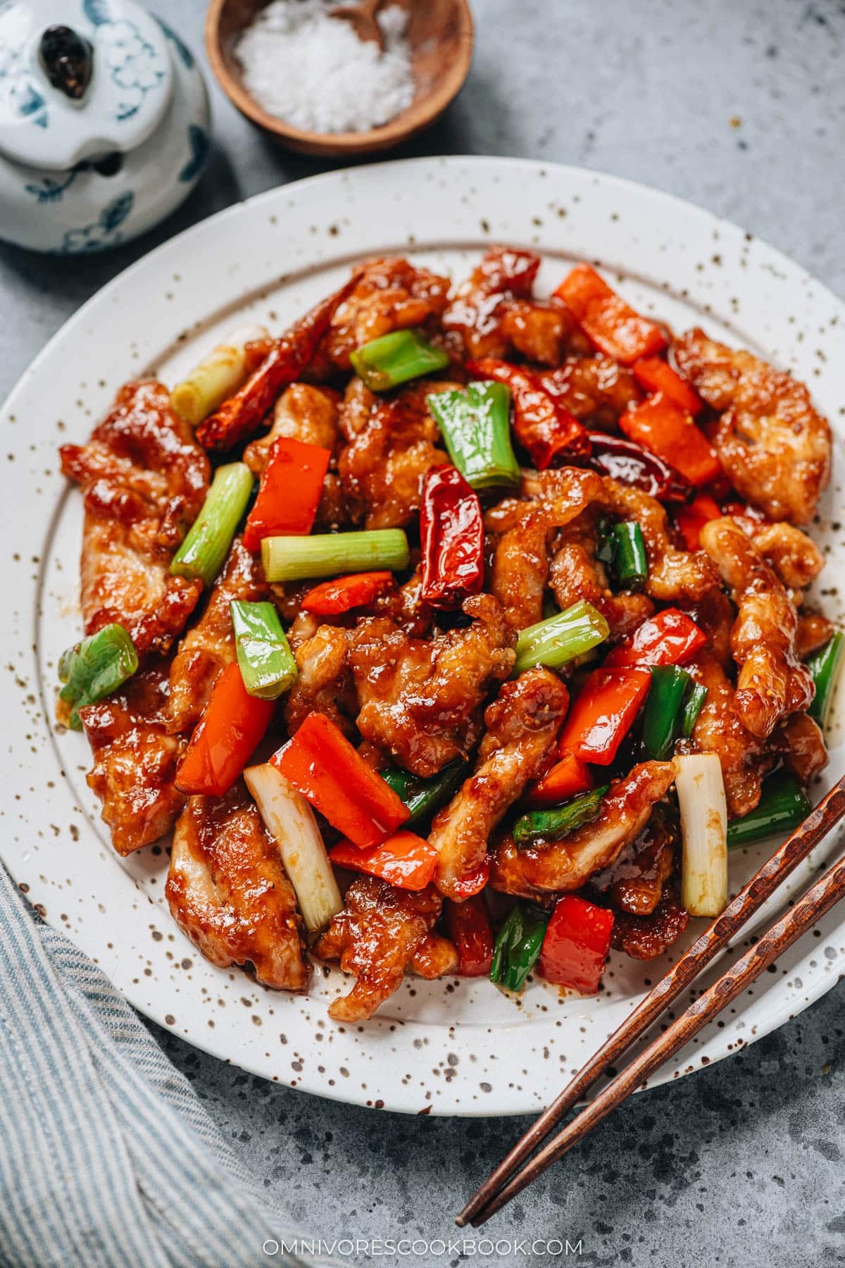 Mongolian chicken with pepper served in a plate close up