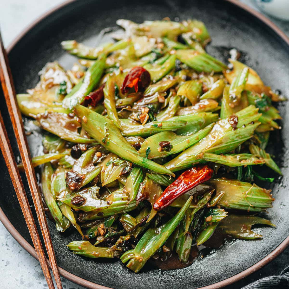 An easy celery stir fry features crunchy thinly sliced celery stir fried with plenty of aromatics and fermented black beans for a rich umami flavor. {Vegetarian Adaptable, Gluten-Free Adaptable}