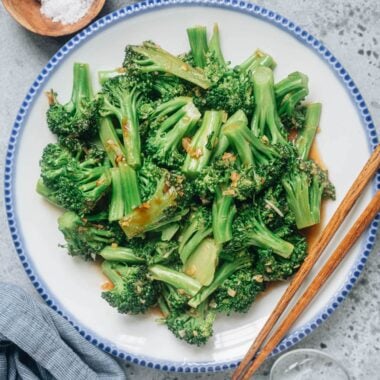 Broccoli with garlic sauce served in a plate