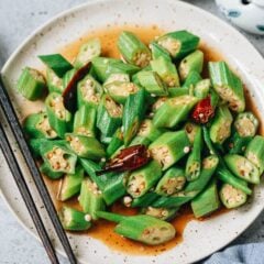 A four-ingredient okra stir fry cooked in a peppercorn and chili pepper infused hot oil until tender and fragrant. Learn how to create the best okra texture that&rsquo;s tender inside, still crisp, yet not slimy. {Vegetarian, Gluten-Free Adaptable}