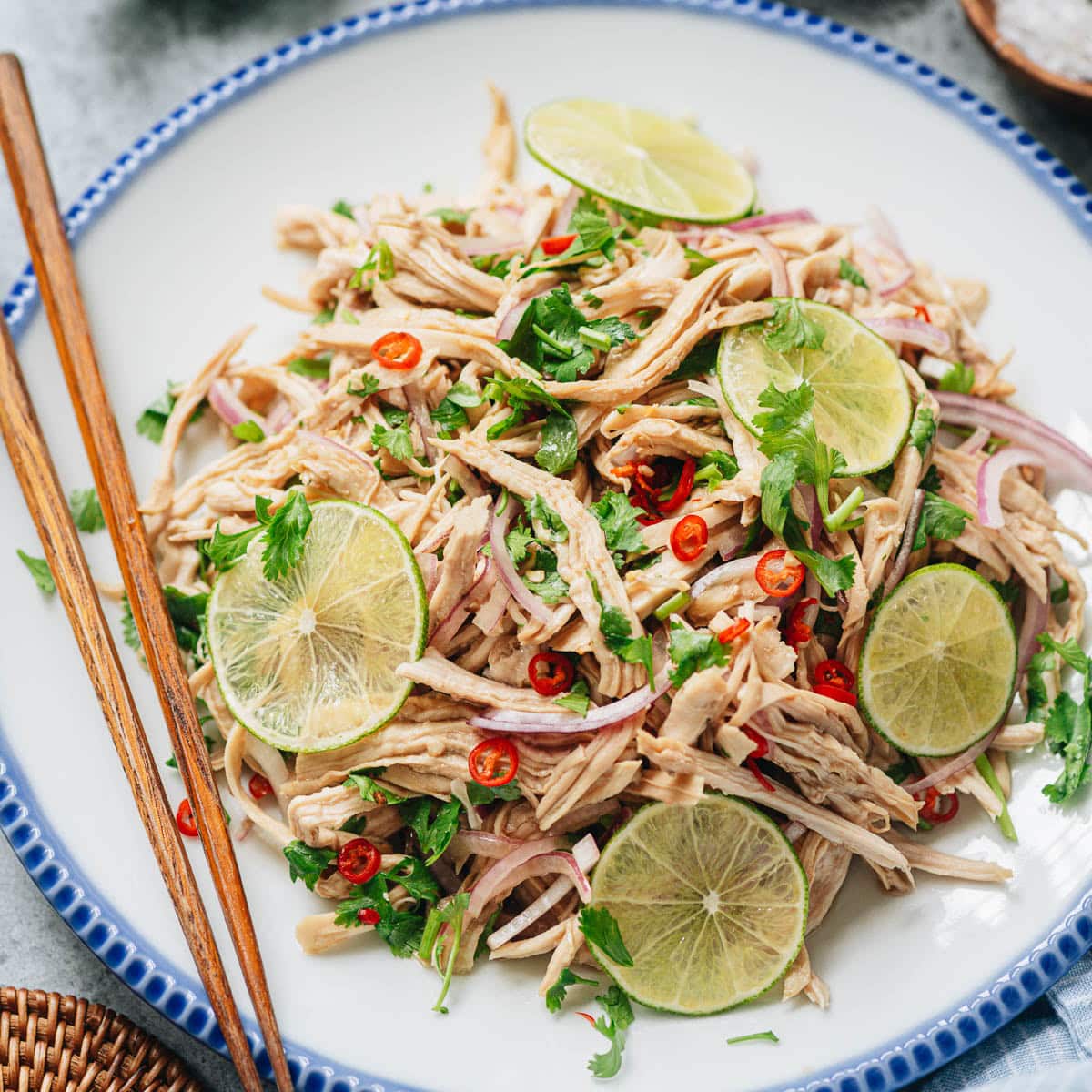 Yunnan lime chicken salad is a refreshing and aromatic dish that is super easy to put together and bursting with flavor. No matter whether you're looking for a dish suitable for the hot weather, or a protein packed dish post-workout, this one is a must try! {Gluten-Free Adaptable}