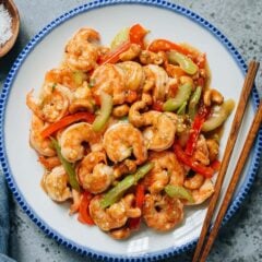 Cashew shrimp is a fast and flavorful stir-fry that combines juicy shrimp, crunchy cashews, and crisp vegetables in a light yet aromatic white sauce.