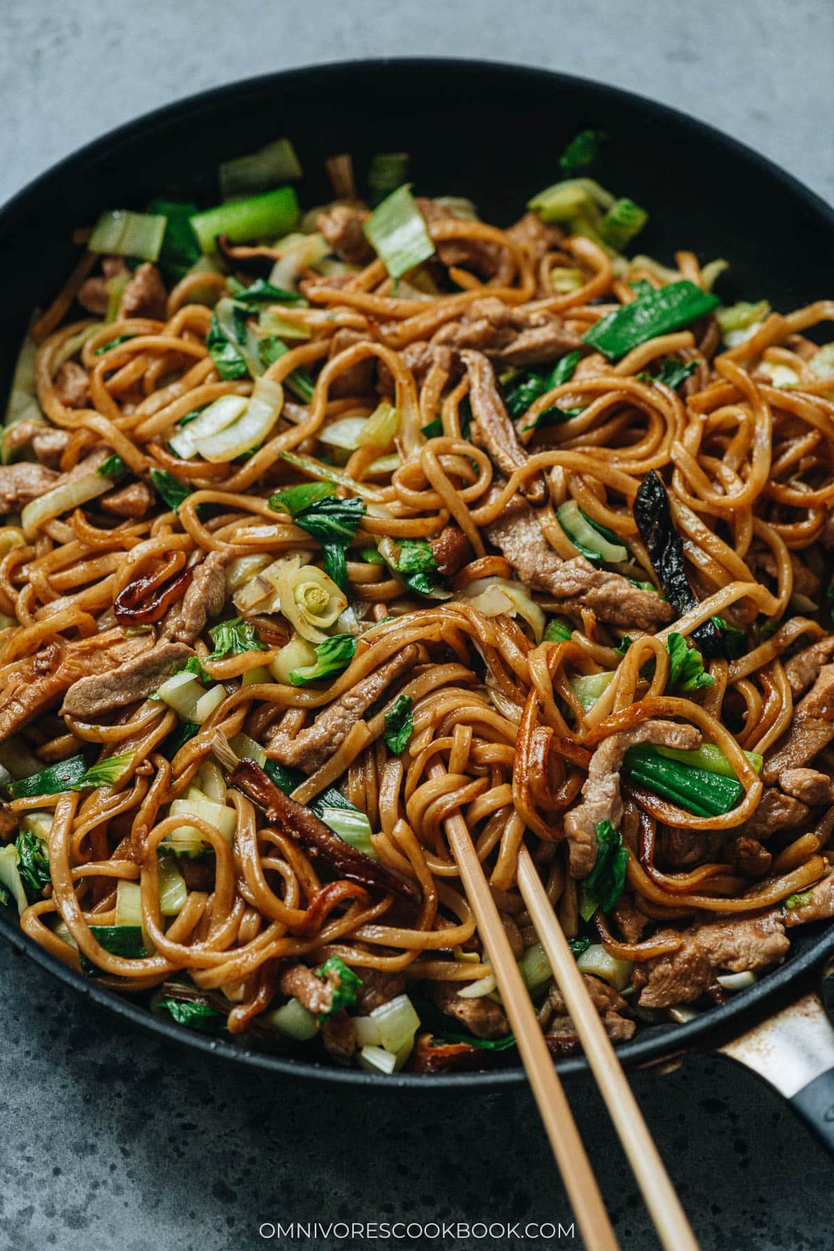 Shanghai fried noodles in a pan close up
