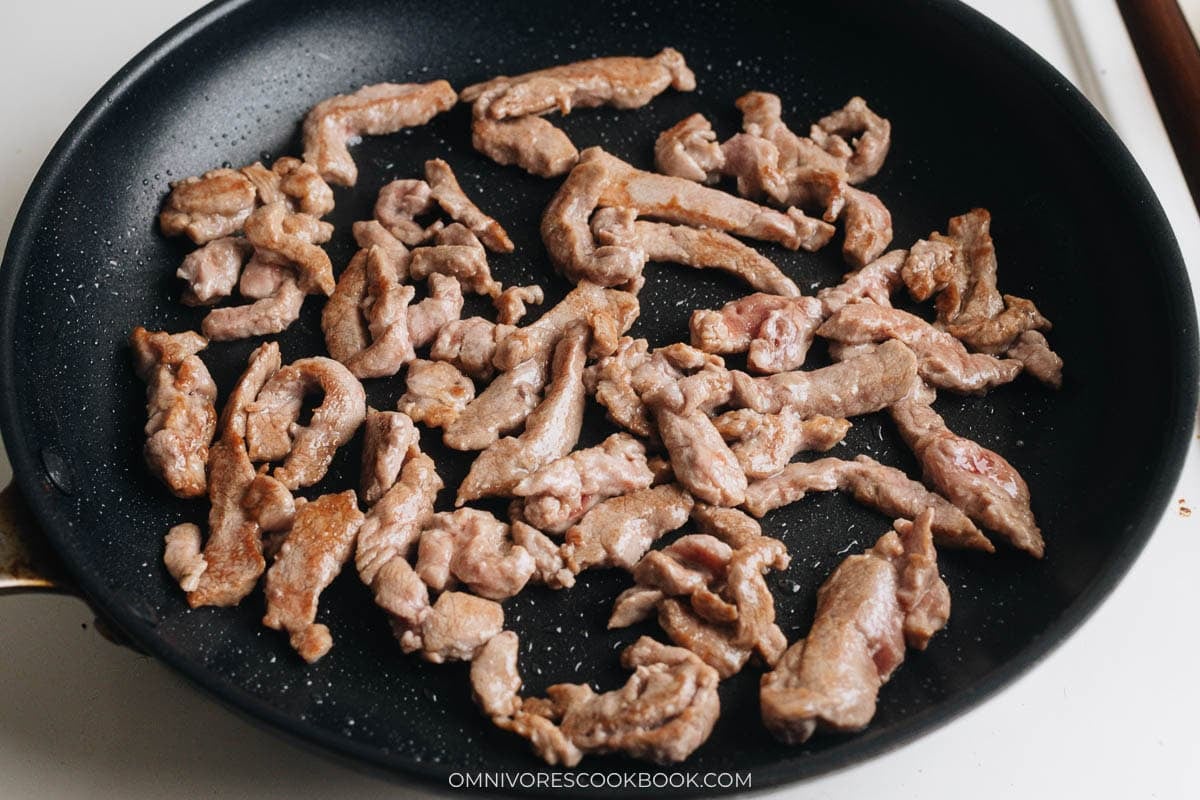 Stir fry the pork
