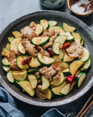 Chinese zucchini and pork stir fry served in a plate