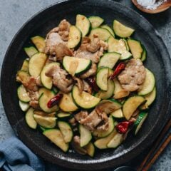 One of my favorite ways to enjoy zucchini is to make this zucchini and pork stir fry, a homestyle Chinese dish that takes less than 25 minutes to put together.