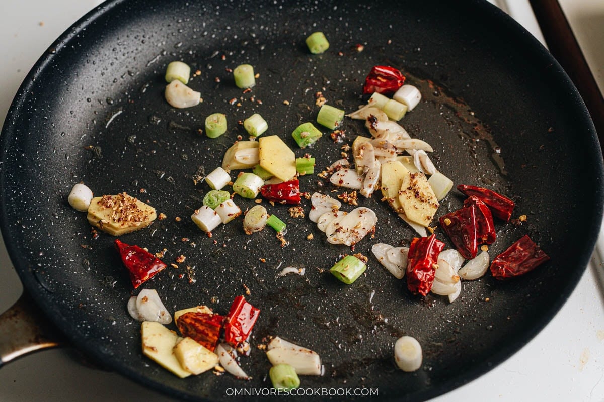 Cook aromatics and spices