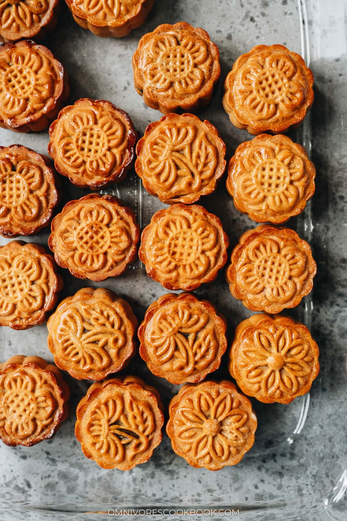 Homemade traditional Cantonese mooncakes in a baking dish
