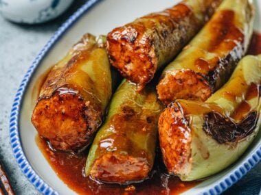 Chinese stuffed peppers served in a plate close up