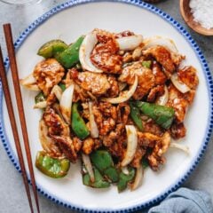 Tender slices of pork are seared until lightly caramelized, tossed with crisp peppers and onions in a glossy savory sauce that clings to every bite. My pork and pepper stir fry delivers that irresistible aroma that makes you rush to the table and heap spoonfuls over steaming hot rice. It&rsquo;s quick and comforting, the kind of dish you&rsquo;ll crave again the very next day.