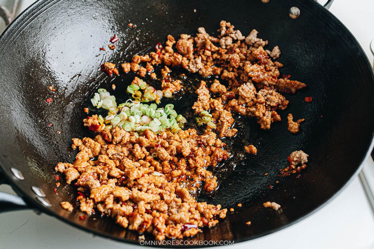 Ground meat cooked with doubanjiang and scallions in a wok
