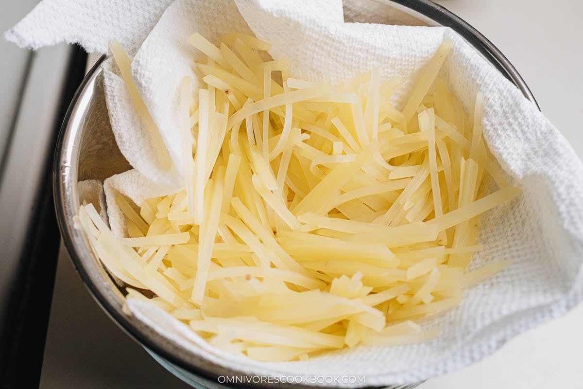 Pat dry julienned potatoes