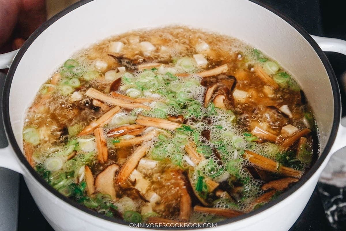 soup base ingredients cooking in a pot