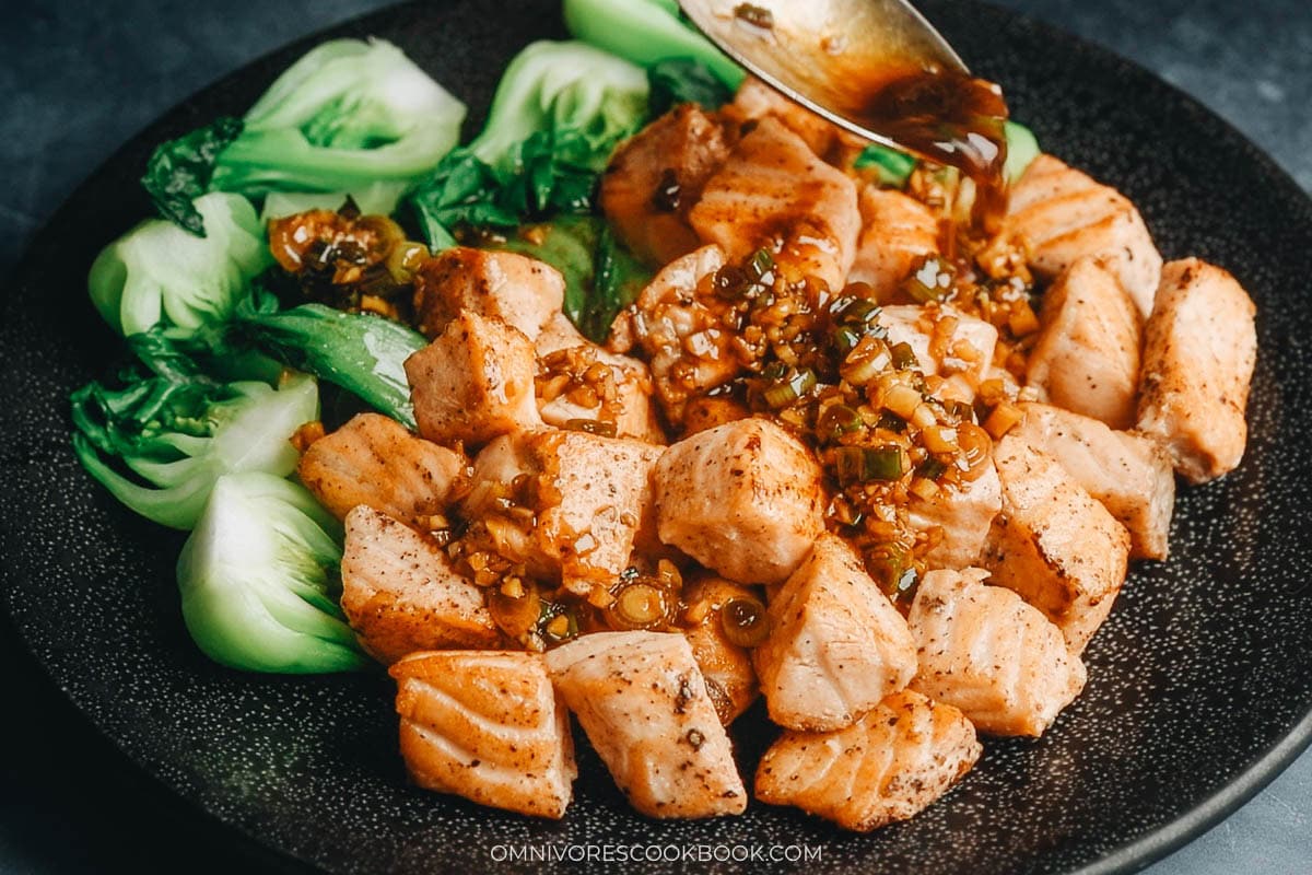 Drizzle the sauce over the salmon and the baby bok choy