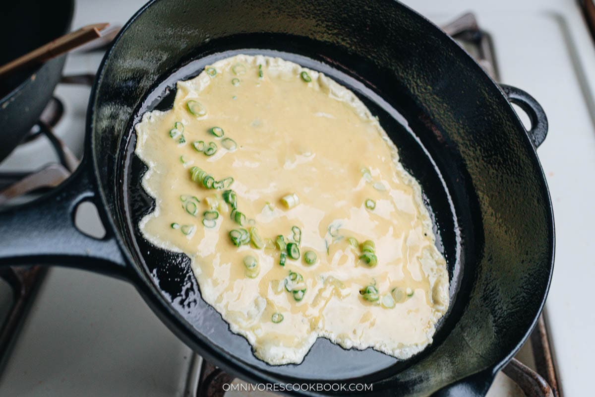 batter into the hot pan and swirl to spread it into a thin layer