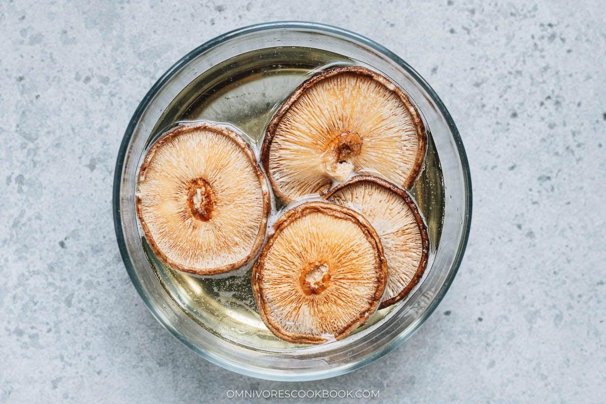 Soak the mushrooms in a bowl with water