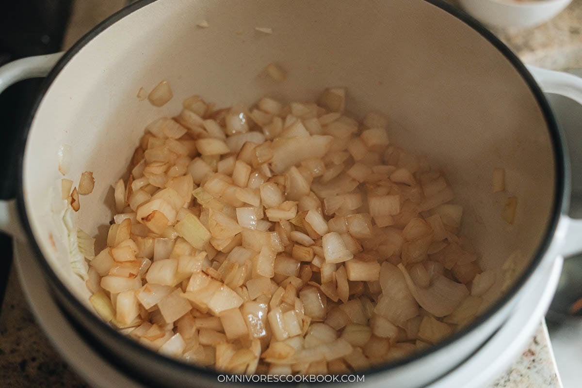 Cooking the onions in a pot